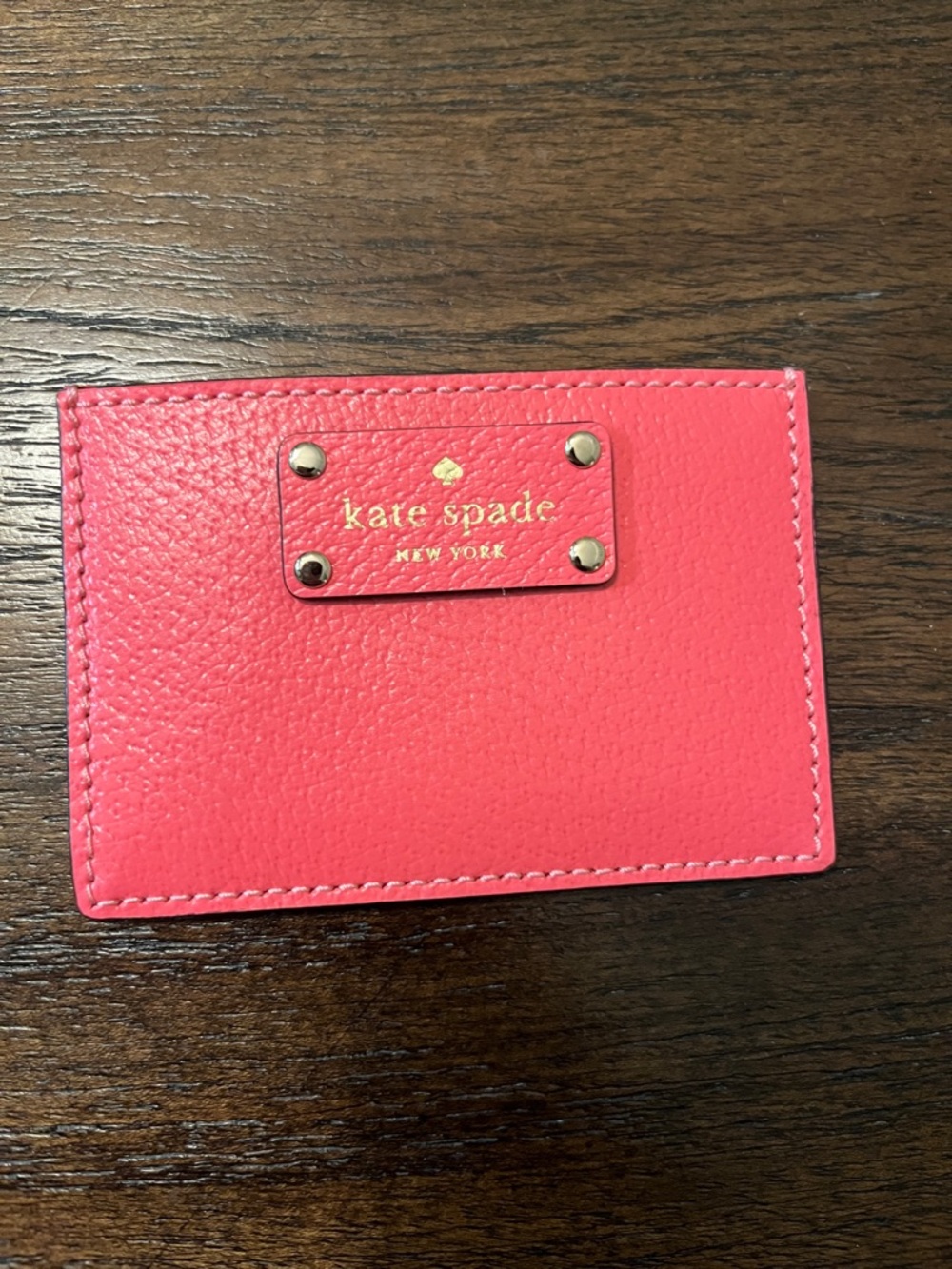 EUC kate spade coral-pink leather card case with gold logo
